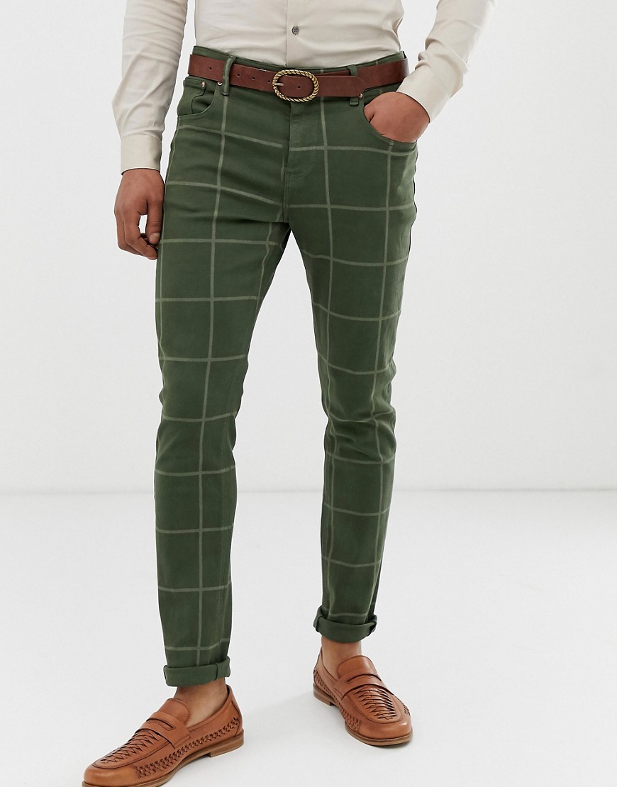 ASOS DESIGN skinny jeans in green with check