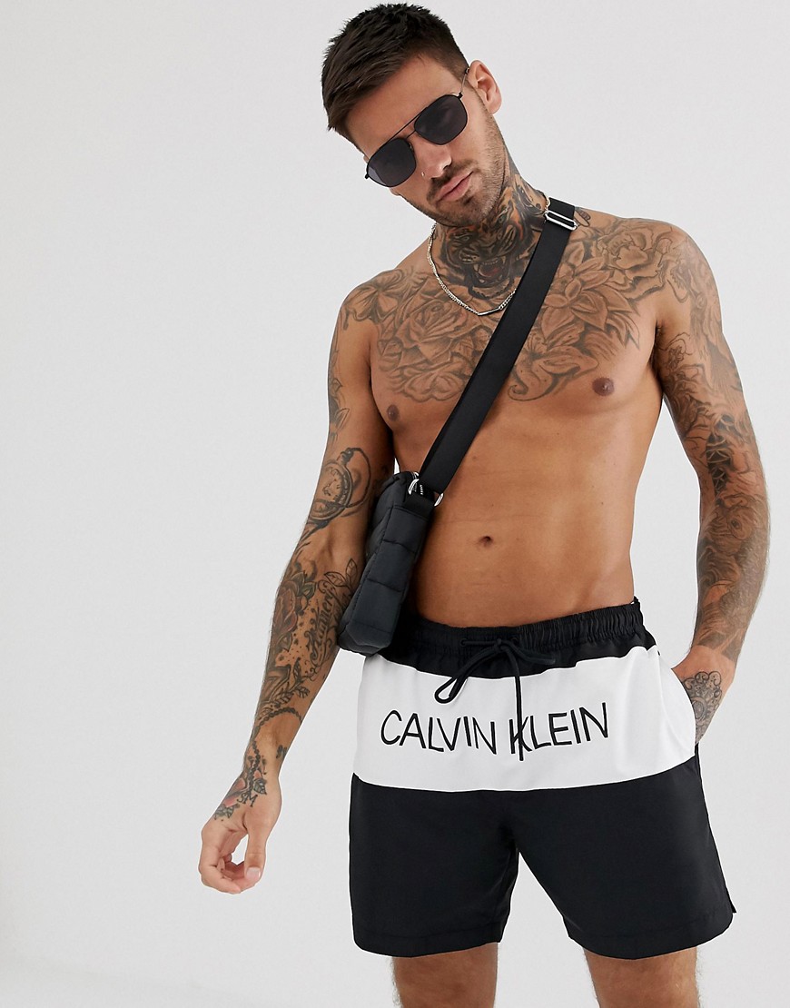 Calvin Klein placement logo swim shorts in black