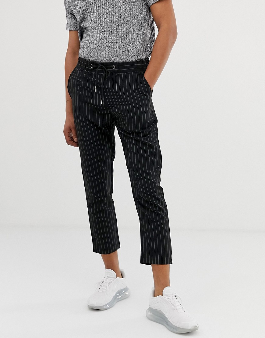 boohooMAN pinstripe cropped trousers in black