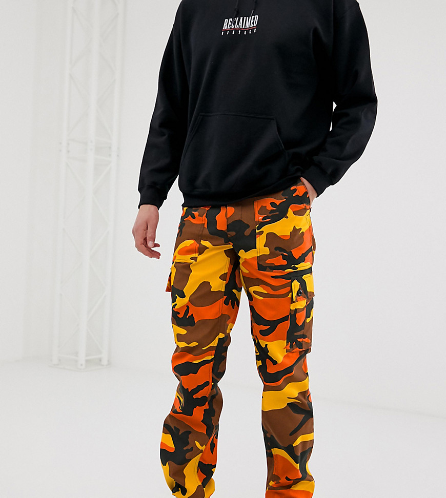 Reclaimed Vintage Revived camo cargo trousers in orange