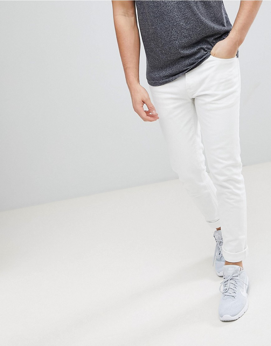ASOS DESIGN skinny jeans in white