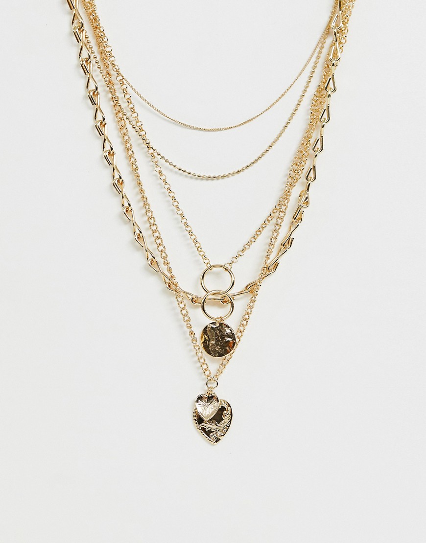 ASOS DESIGN multirow necklace with worn coin and vintage style heart pendants in gold tone