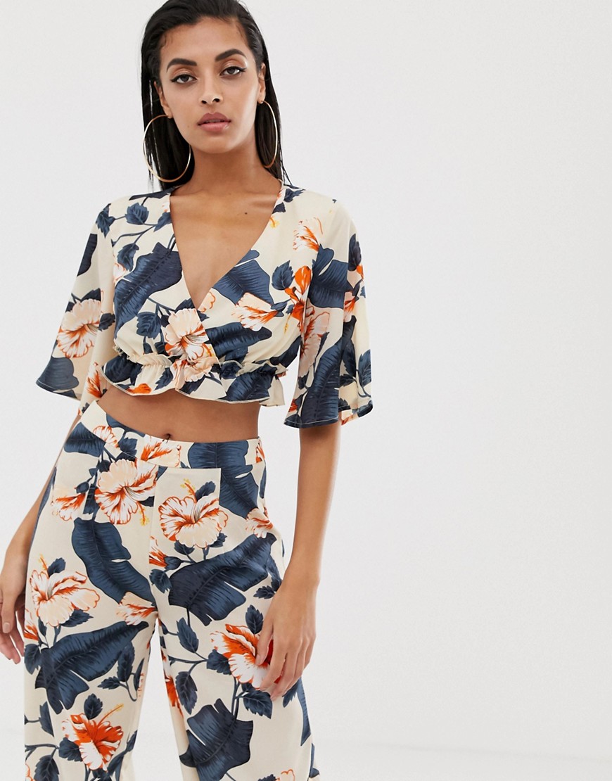 PrettyLittleThing co-ord ruffle hem beach crop top in floral