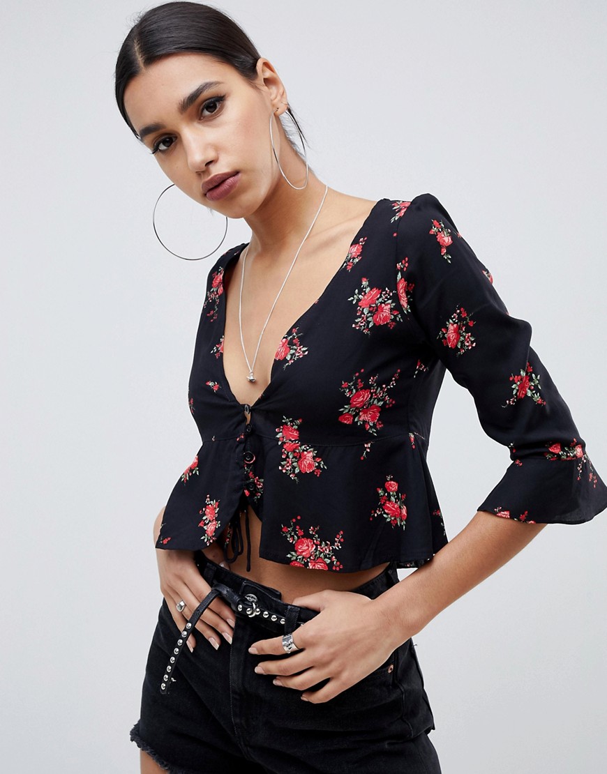 Motel tie front blouse in floral