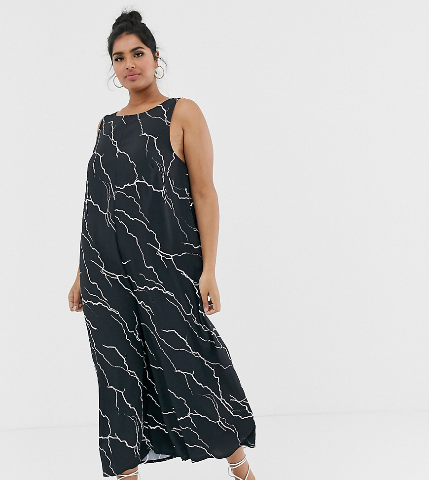 Another Reason Plus relaxed wide leg jumpsuit with open back in lightening print