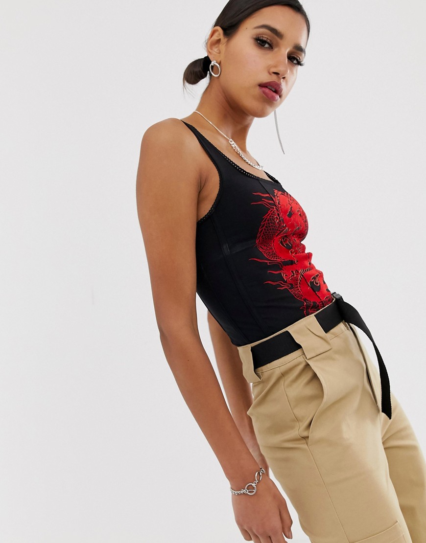 Jaded London structured corset top with lace up back and flocked dragon print