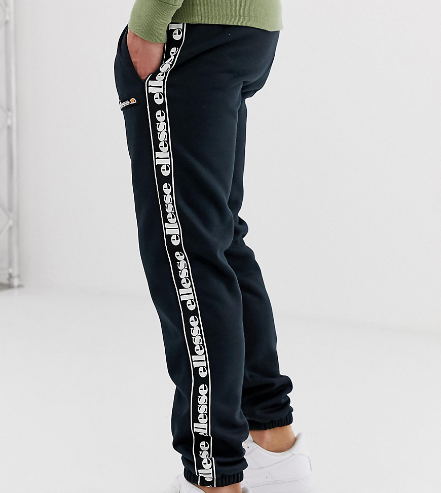 ellesse Jacopo recycled fleece joggers with taping in black exclusive at ASOS