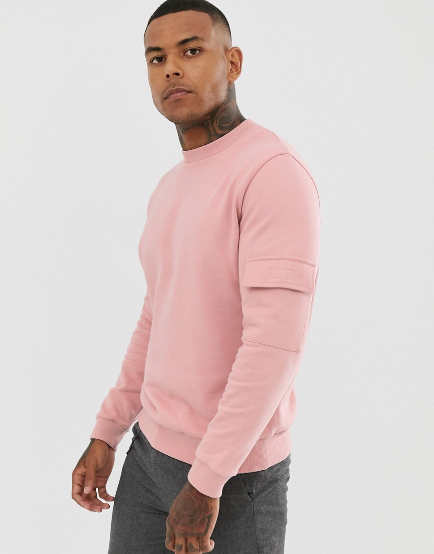 ASOS DESIGN sweatshirt with utility sleeve pocket in pink