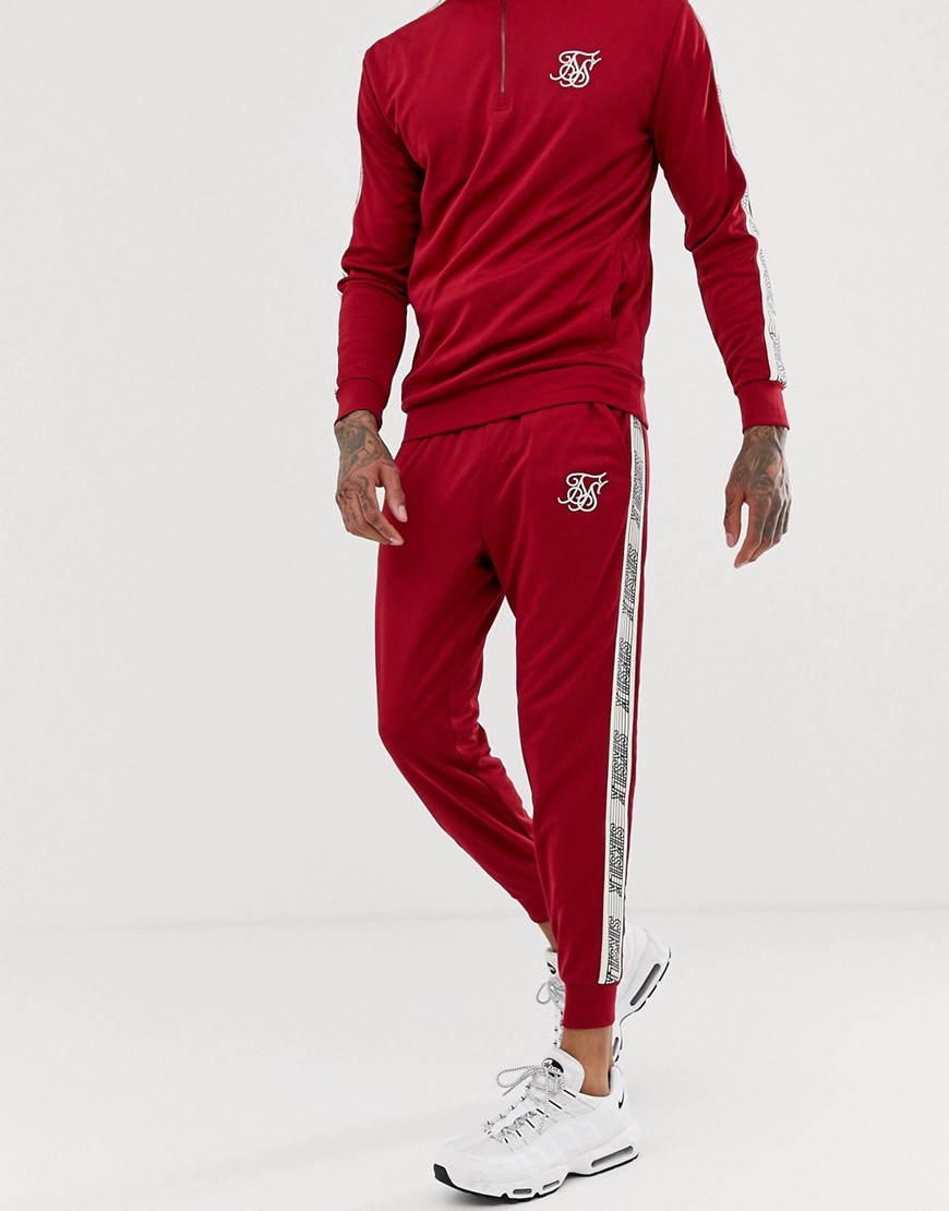 SikSilk joggers in red with side stripe