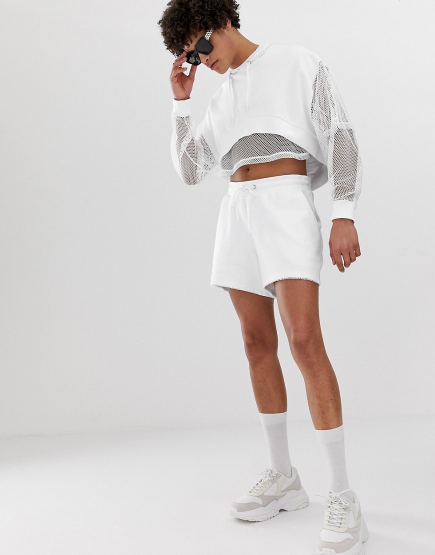 ASOS DESIGN co-ord jersey shorts with mesh overlay in white