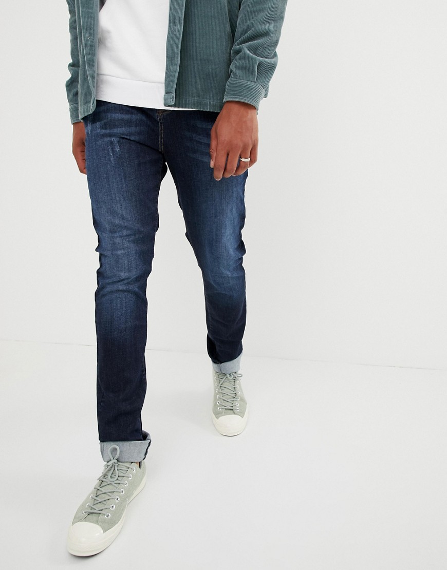 Brooklyn Supply Co skater fit jeans In washed Indigo
