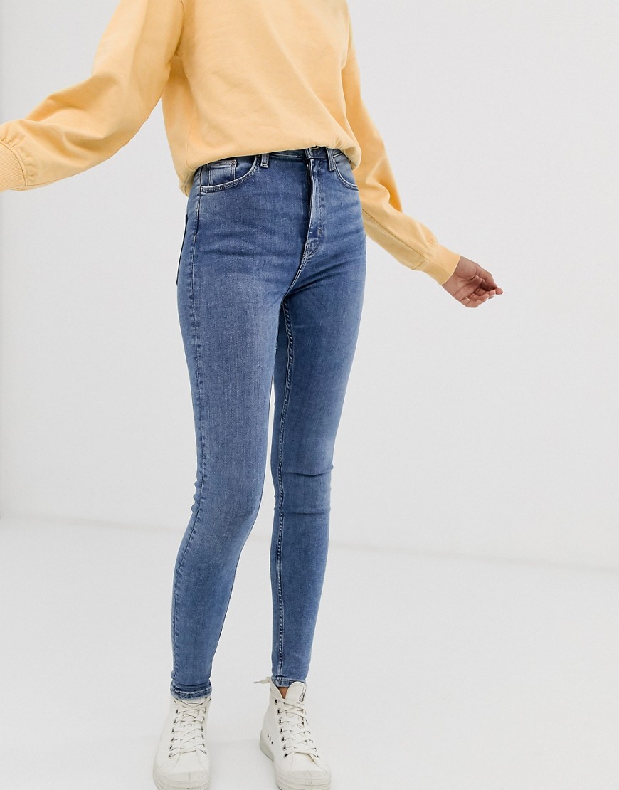 Weekday cotton blend high waisted skinny jeans in mid blue - MBLUE