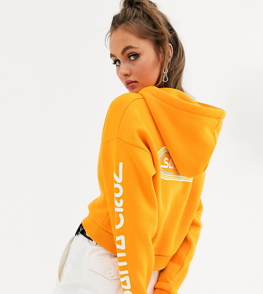 Santa Cruz Woodstock cropped hoodie with arm and back print in orange Exclusive to ASOS
