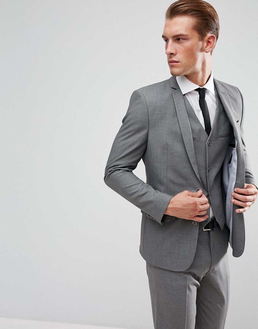 Человек в сером сюртуке. Пиджак ASOS мужской серый. Серый приталенный пиджак ASOS Design. Приталенный пиджак. Парень в сером костюме.