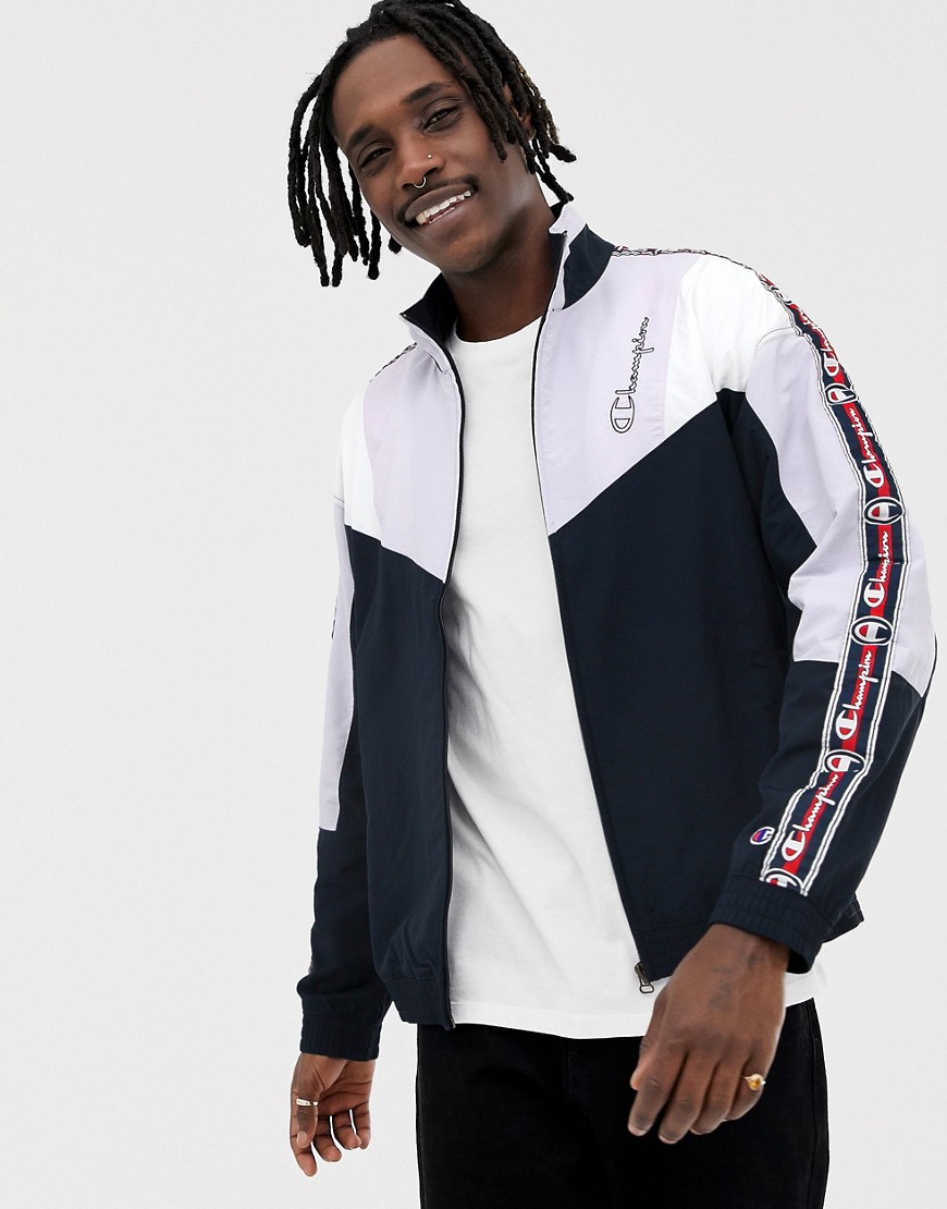 Champion track jacket with sleeve taping in navy