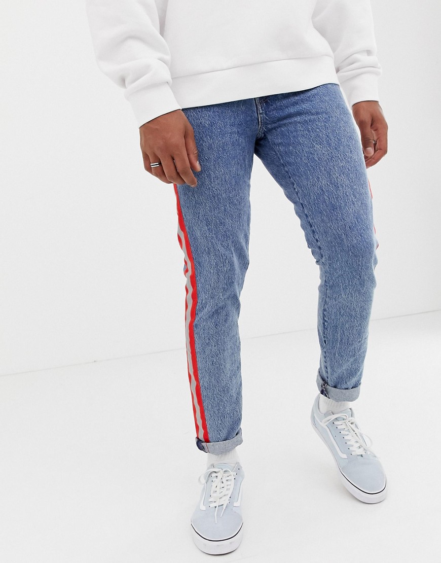 Levi's 512 reflective side stripe tape slim tapered fit jeans in acid light wash