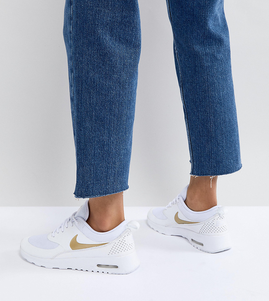 Nike Air Max Thea Trainers In White And Gold - White