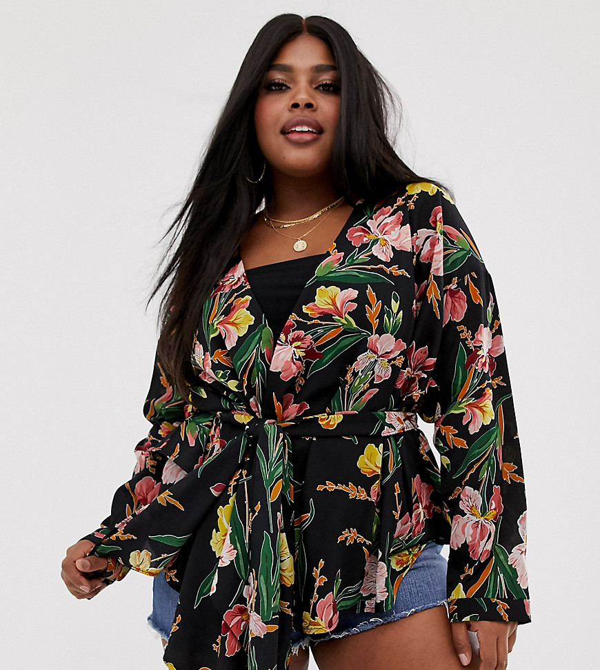 PrettyLittleThing Plus wrap blouse in black tropical floral