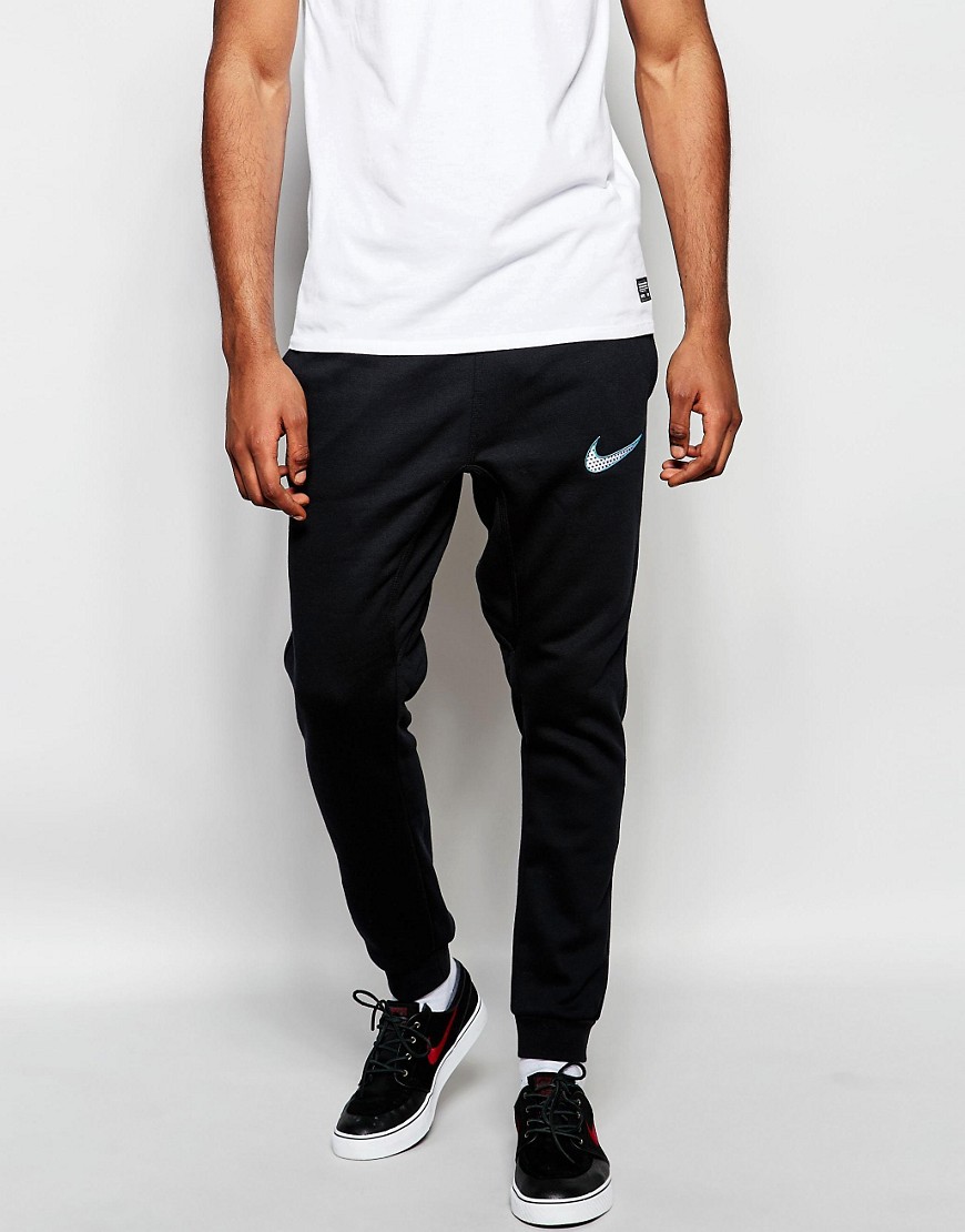 Image 1 of Nike Skinny Joggers With Swoosh Logo 727766-010