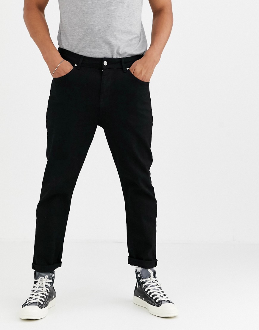 ASOS DESIGN tapered carrot fit jeans in black