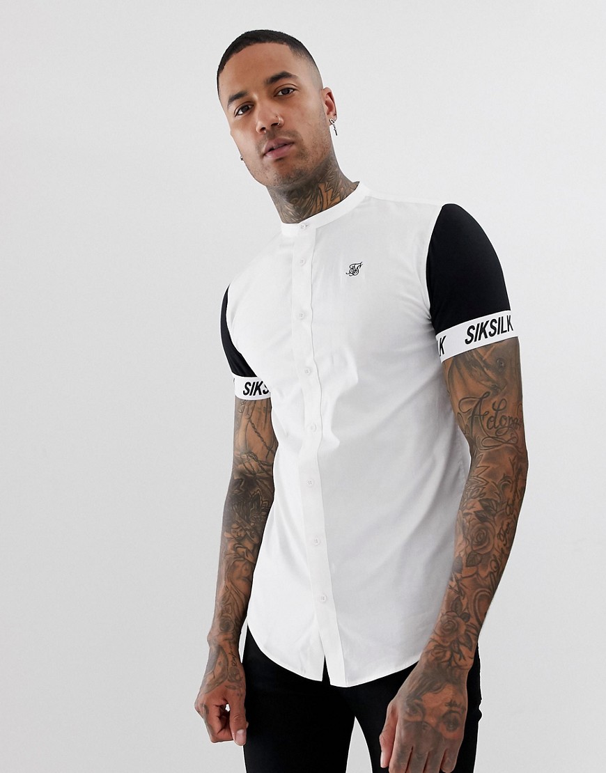 SikSilk short sleeve shirt in black with jersey sleeves