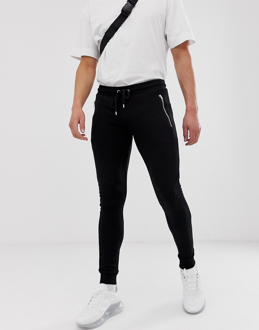 ASOS DESIGN super skinny joggers with zips in black