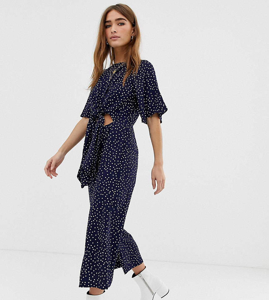Glamorous Petite relaxed jumpsuit with tie front in spaced spot print