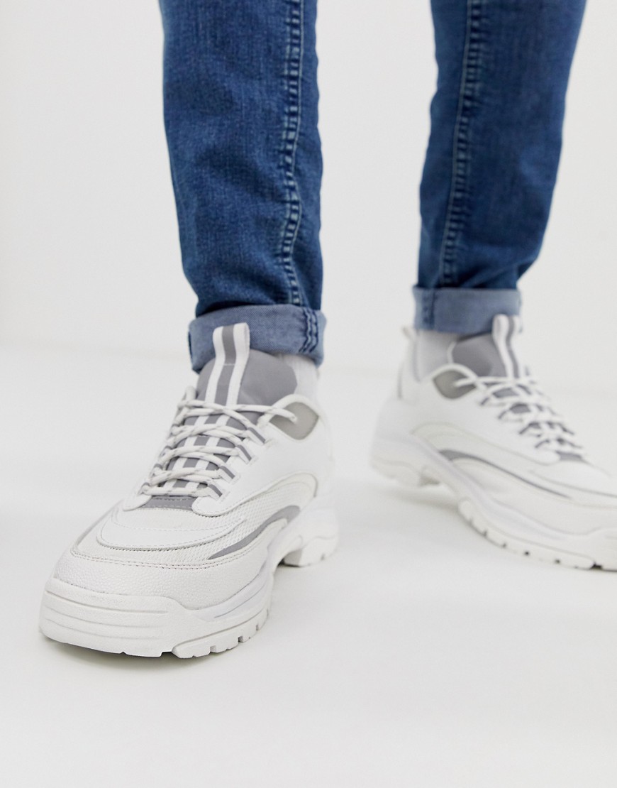 ASOS DESIGN trainers in white with reflective panels and chunky sole