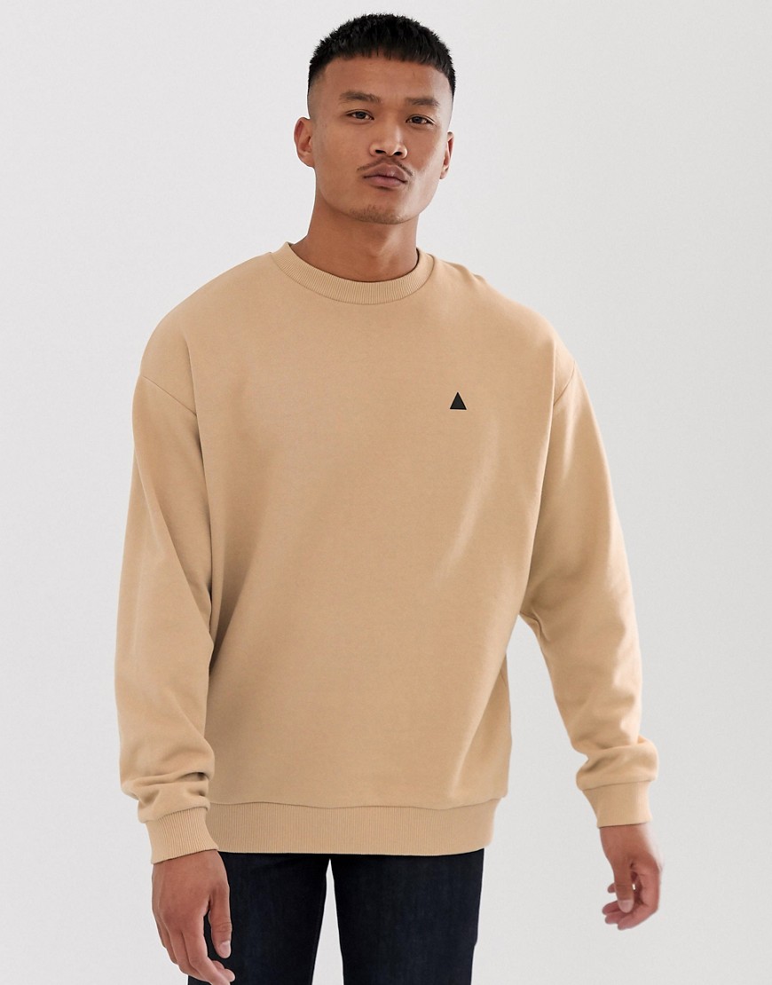 ASOS DESIGN oversized sweatshirt in beige with triangle