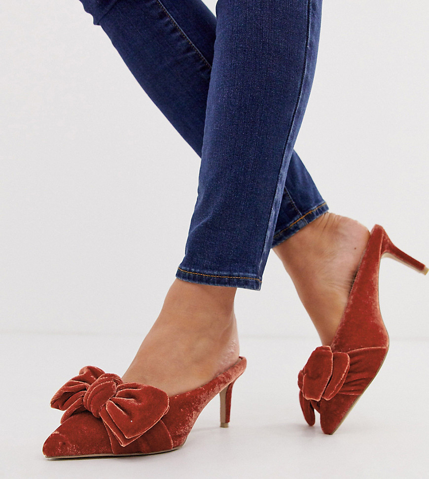 ASOS DESIGN Wide Fit Wonder pointed mid-heeled bow mules in rust velvet