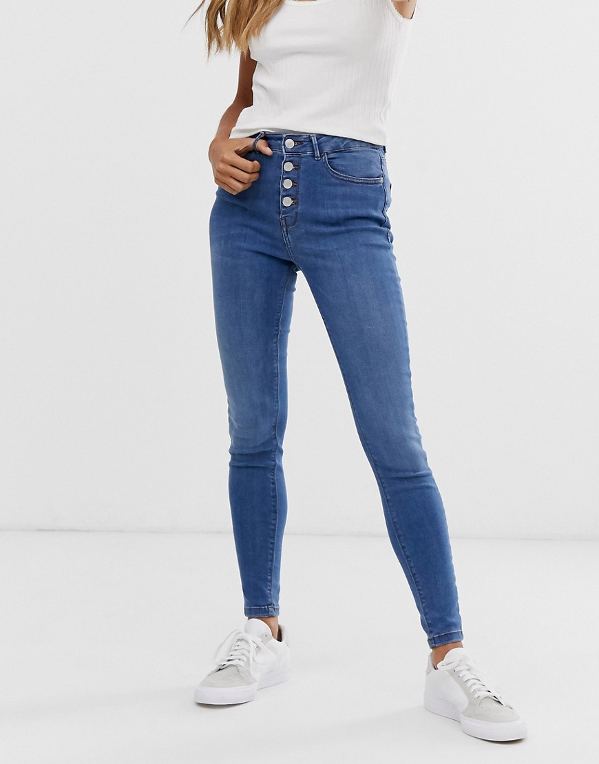 b.Young skinny jeans with button fly