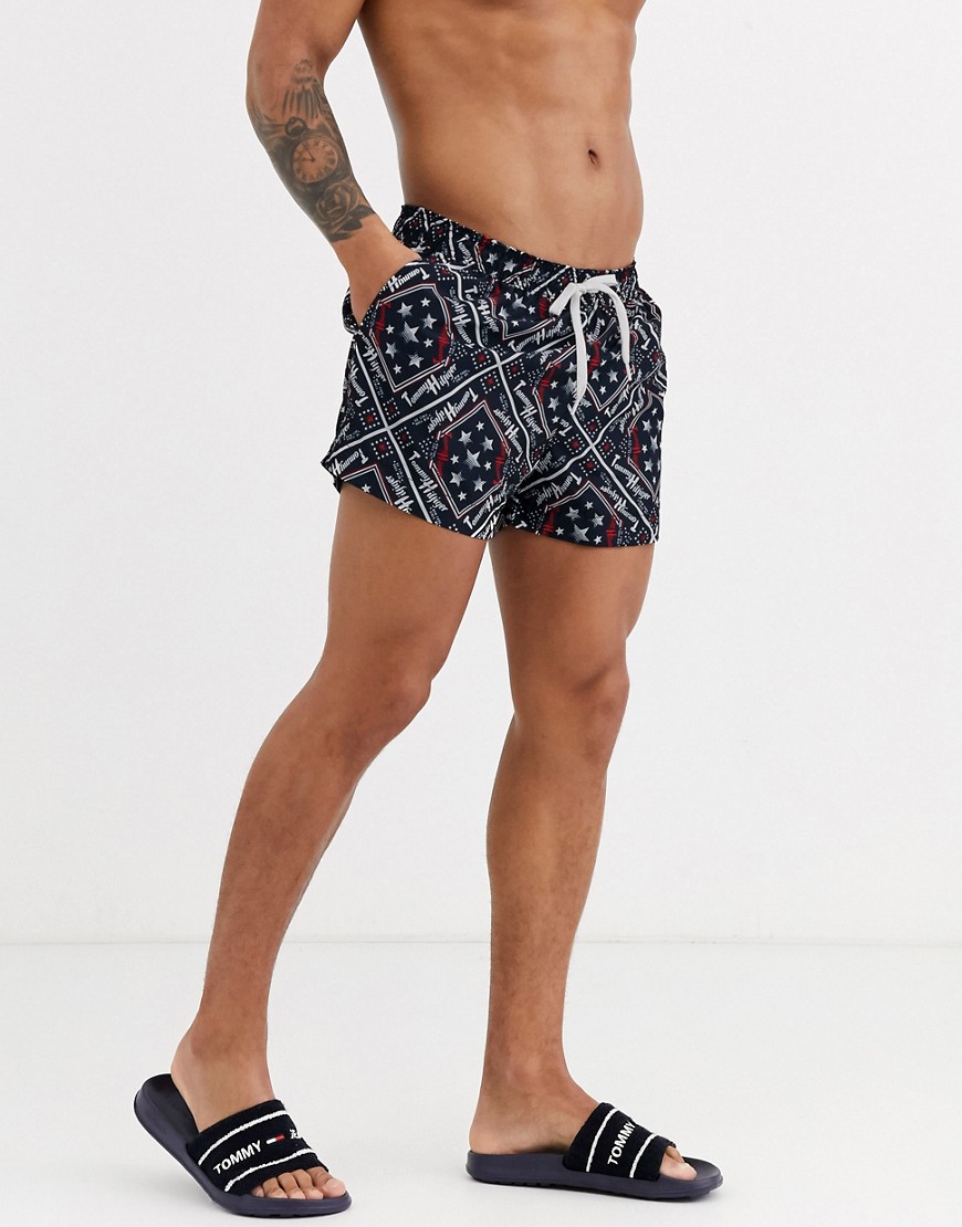 Tommy Hilfiger short length all over star print swim shorts in navy