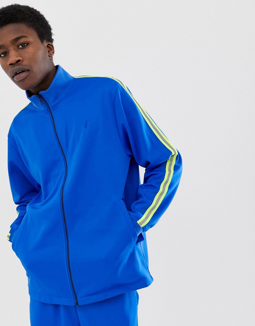 Fairplay Nera track jacket with neon sleeve taping in blue