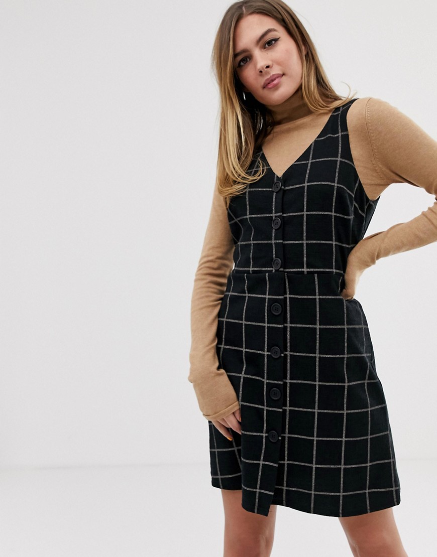 New Look button through pinny in grid check