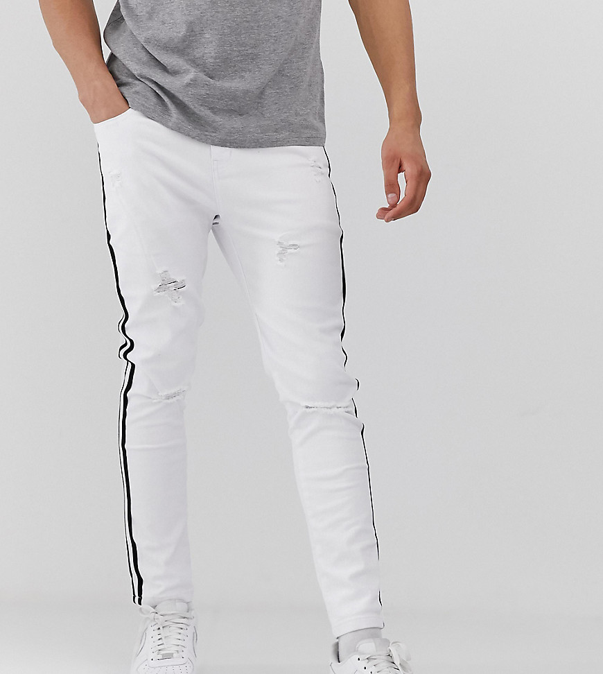 Mauvais muscle jeans with distressing and side stripe