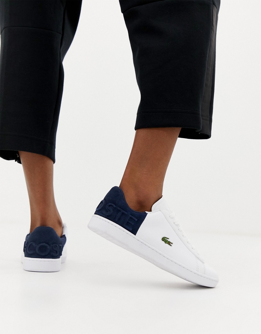 Lacoste Carnaby Evo white trainers with navy panel