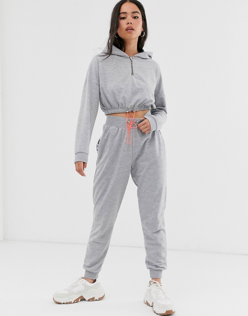 ASOS DESIGN tracksuit hoody with printed lining / jogger with toggles