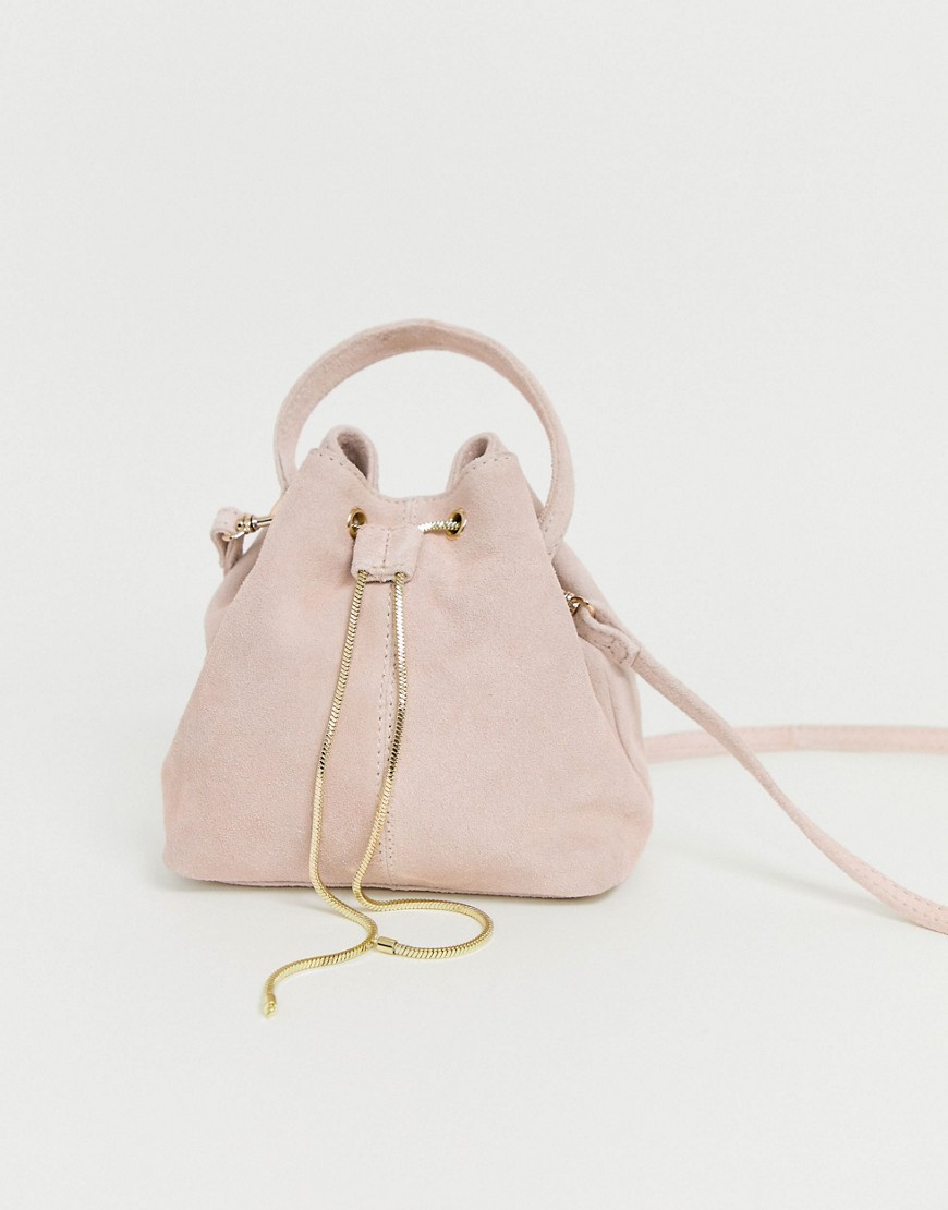 ASOS DESIGN suede bucket bag with snake chain detail