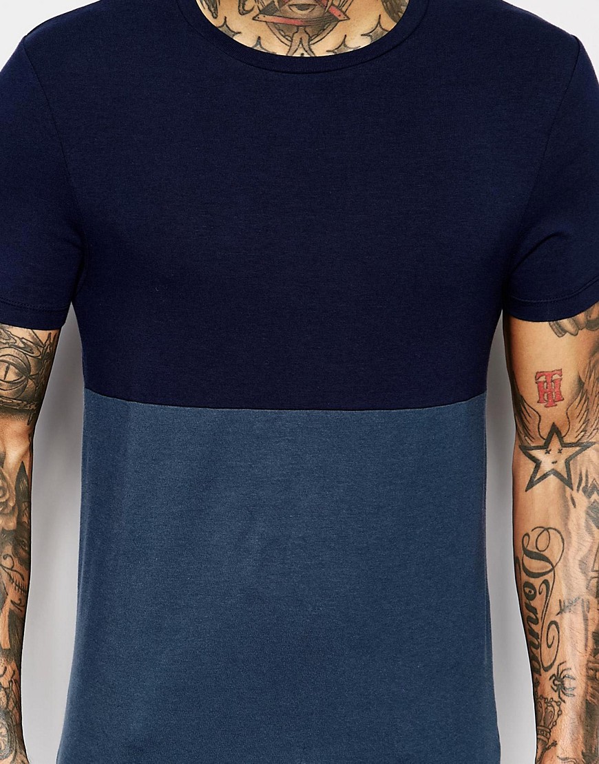 ASOS | ASOS Muscle T-Shirt With Half And Half Cut And Sew In Blue at ASOS
