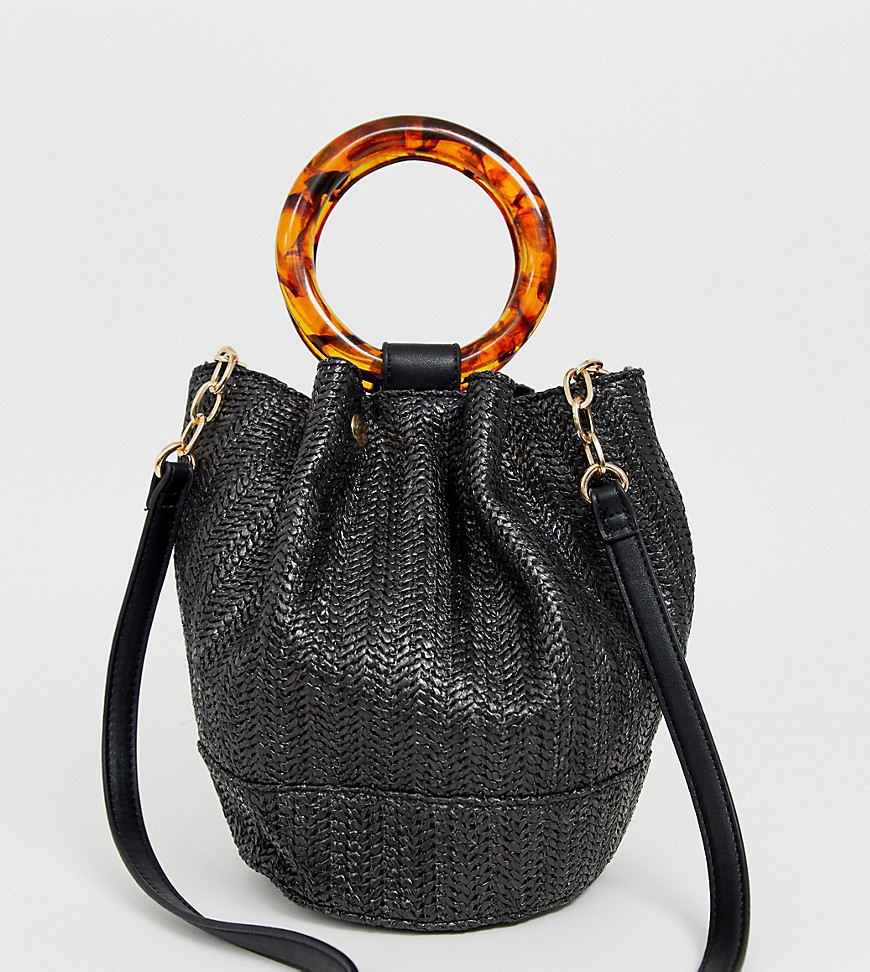 Faith black faux straw bucket bag with tortoise effect handle detail