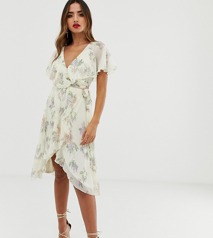 ASOS DESIGN midi dress with cape back and dipped hem in cream based floral