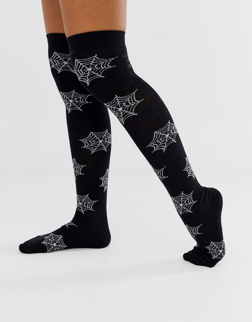 ASOS DESIGN Halloween cobweb over the knee socks in black and white