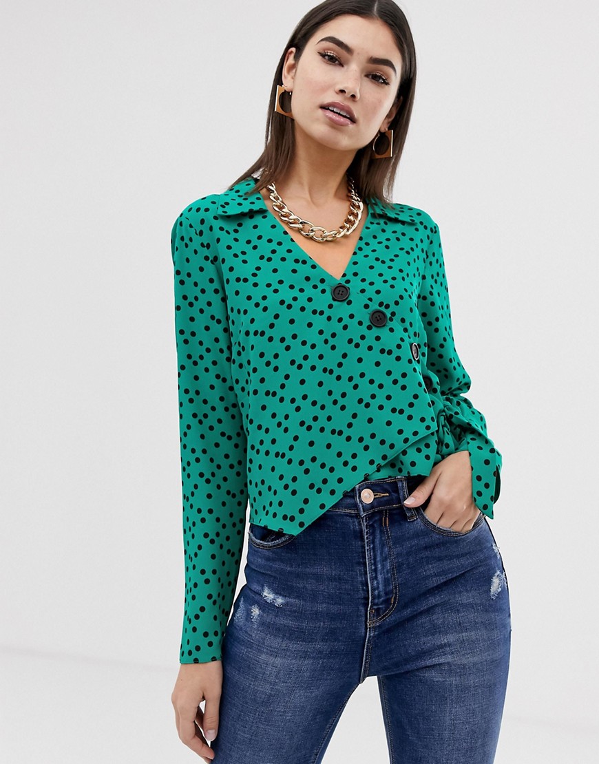 ASOS DESIGN wrap top with asymmetric button detail in spot print with long sleeves