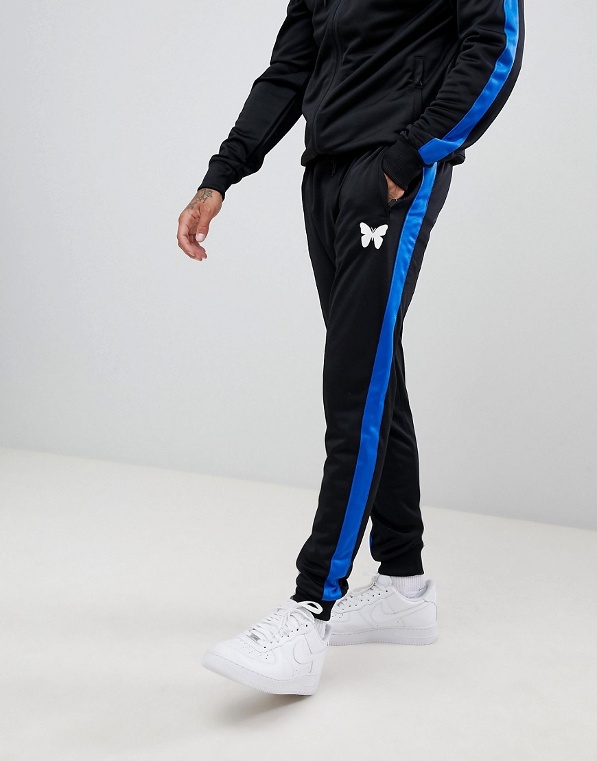 Good For Nothing skinny joggers in black with blue side stripe