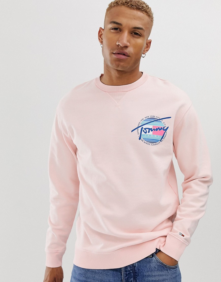 Tommy Jeans circular logo crew neck sweatshirt in washed peach