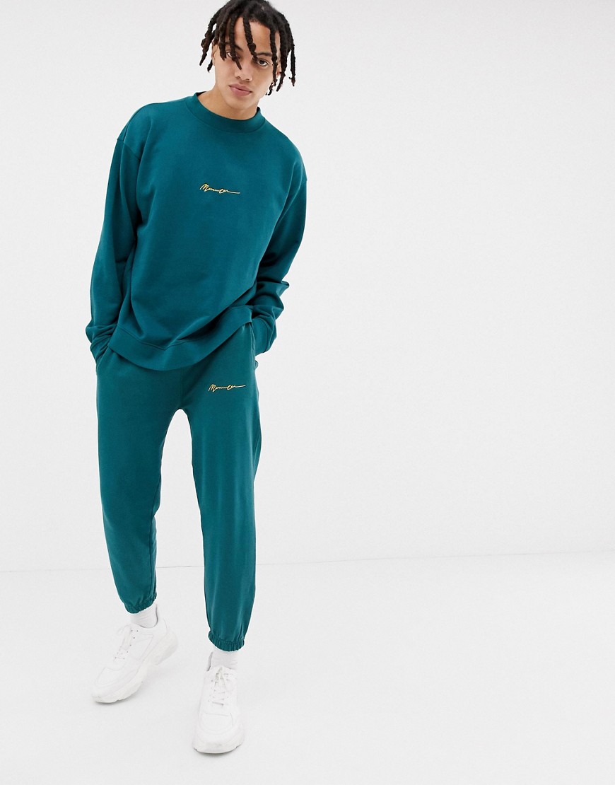 Mennace joggers in green with script logo