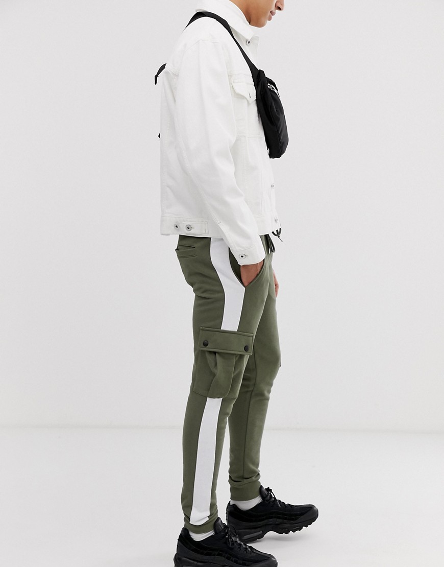 ASOS DESIGN skinny joggers with cargo pockets and side stripes in khaki