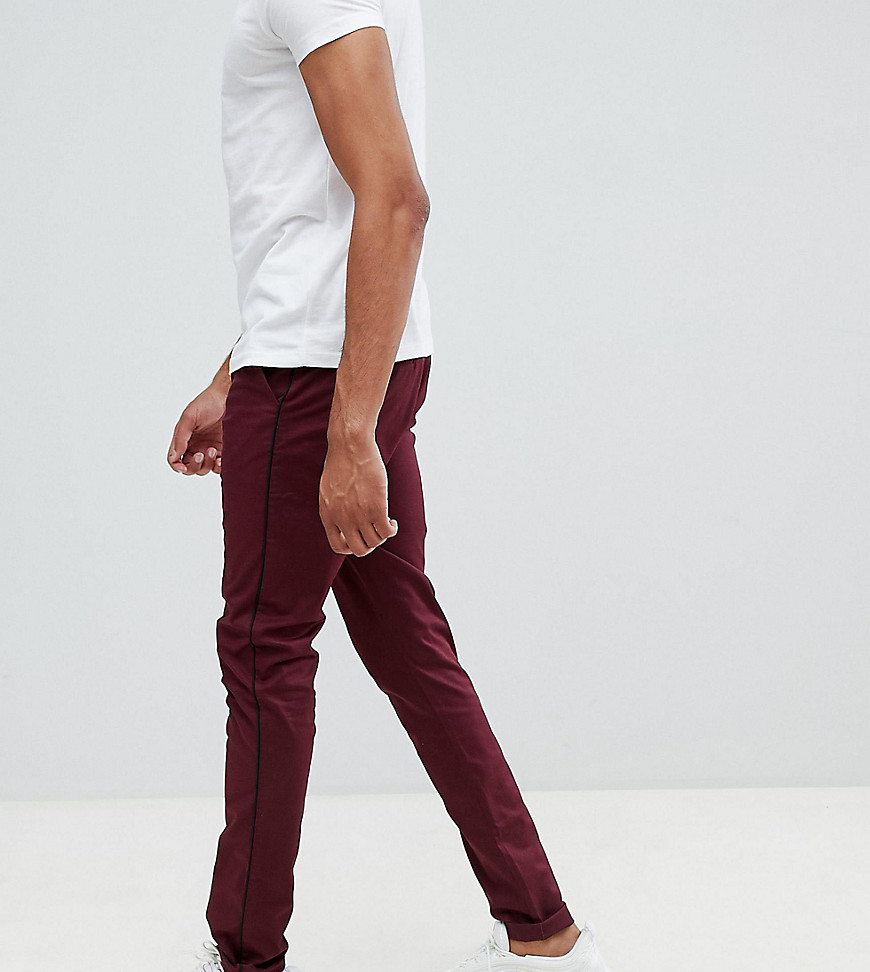 ASOS DESIGN Tall skinny trousers in burgundy with black side piping
