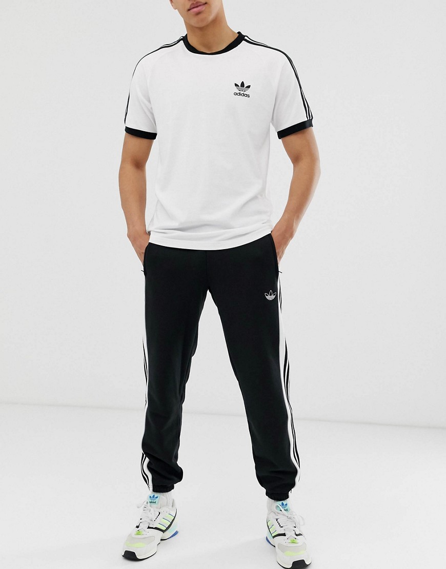 adidas Originals joggers with outline 3 stripes in black