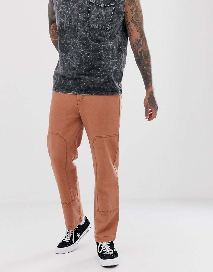 Sacred Hawk tapered trousers in tan